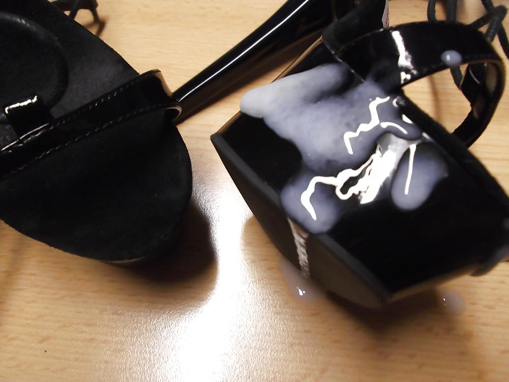 11P Cum on black gladiator highheels