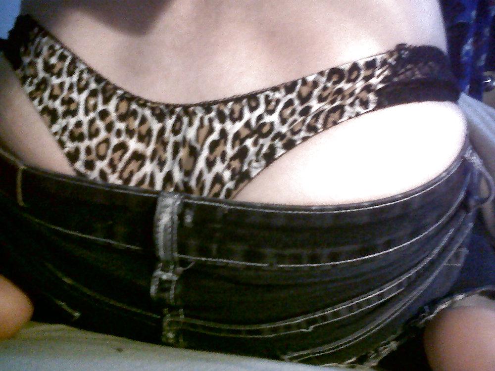 16P Leopard thong and bra with tight jeans
