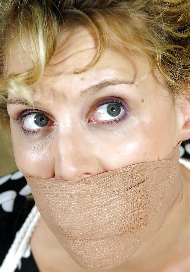 25P Beautiful Curly-haired Blonde Tied Up with Legs Spread