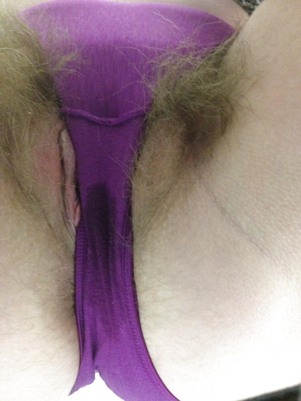 25P Furry kitty shows off in purple panties in bar bathroom