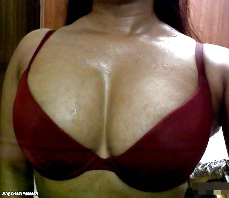 12P Indian babe down blouse and bra exposing lovely boobies 