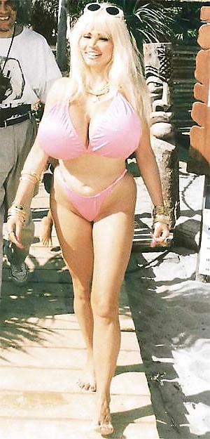 23P Huge fake tits in bikini