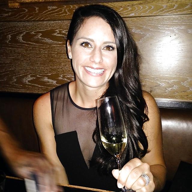 24P Ali Krieger posing in her sports bra