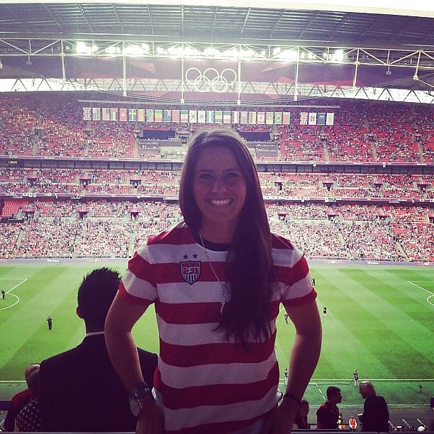 24P Ali Krieger posing in her sports bra