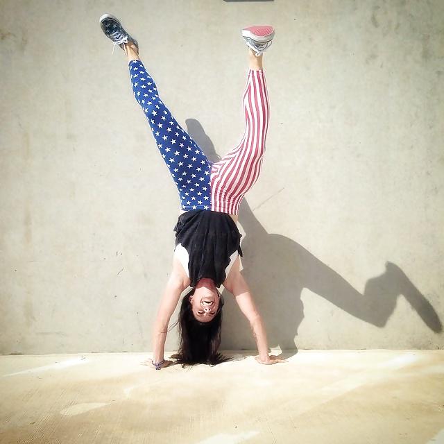 24P Ali Krieger posing in her sports bra