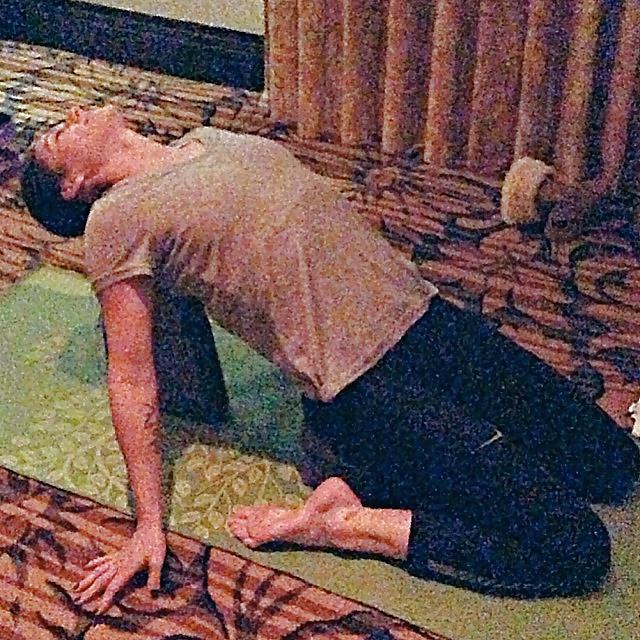 24P Ali Krieger posing in her sports bra