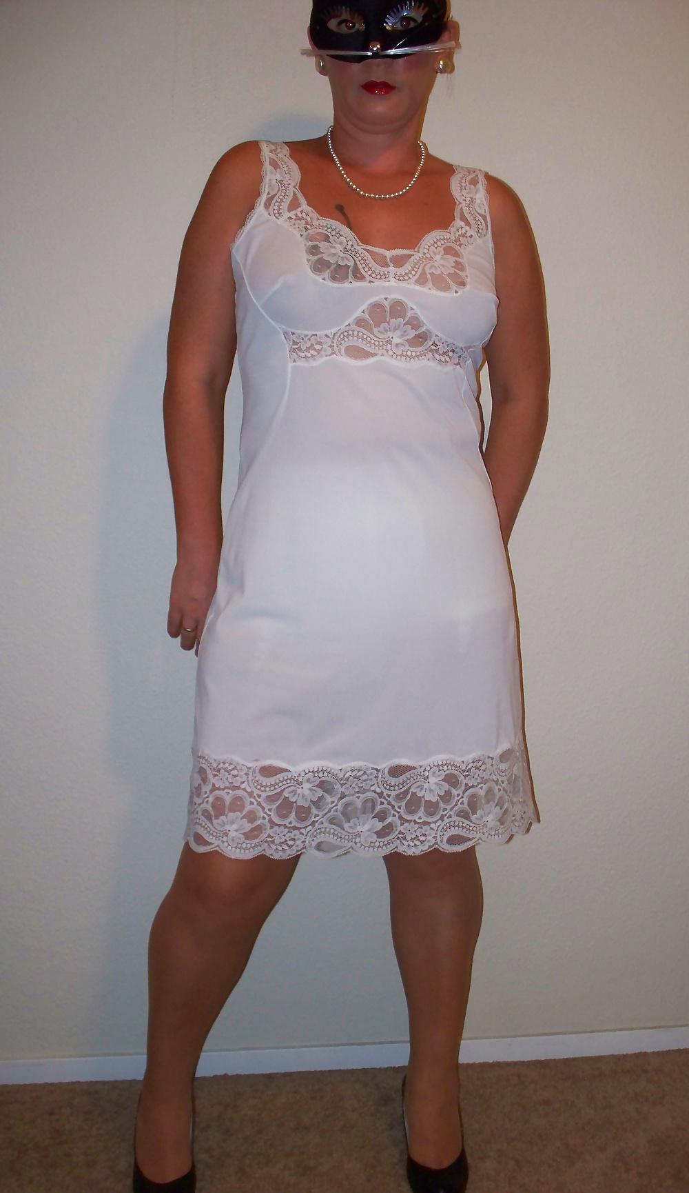 24P Wife strips in white slip and girdle