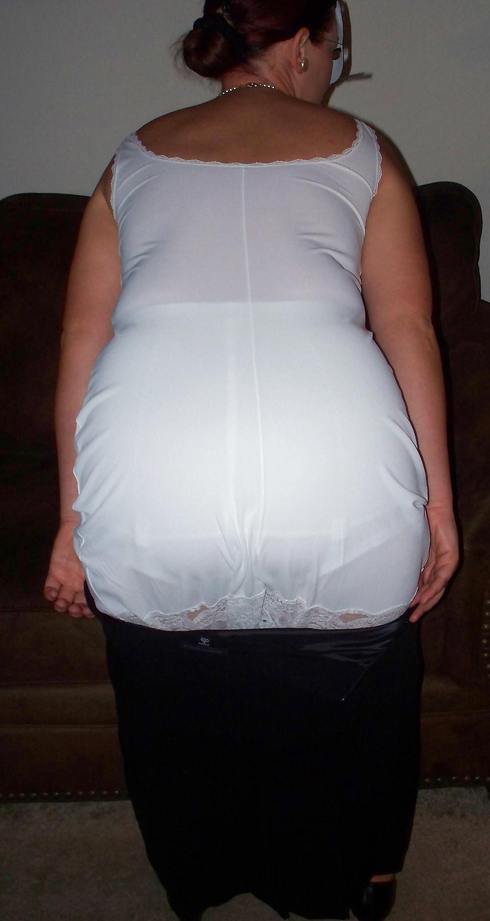 24P Wife strips in white slip and girdle