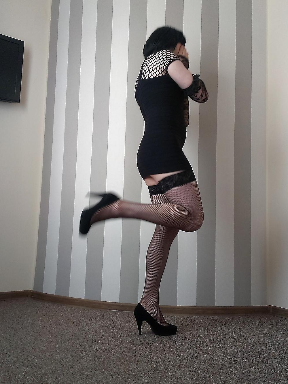 12P In a hotel room - black minidress, stockings and heels 