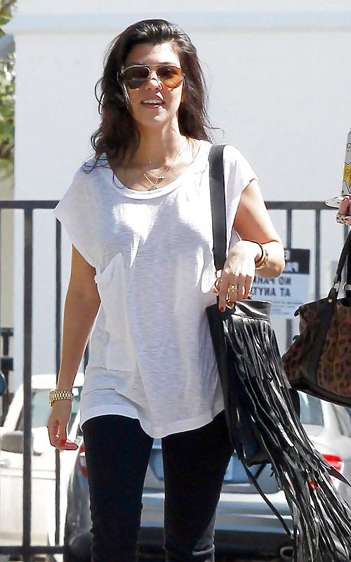 8P Kourtney Kardashian (black bra visible)