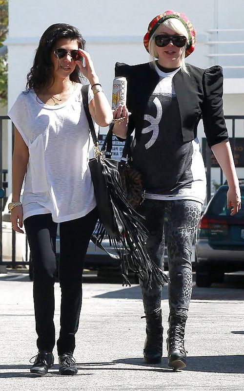 8P Kourtney Kardashian (black bra visible)