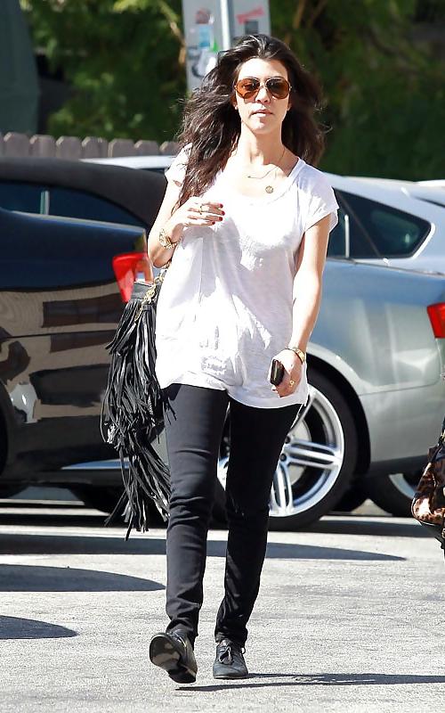 8P Kourtney Kardashian (black bra visible)