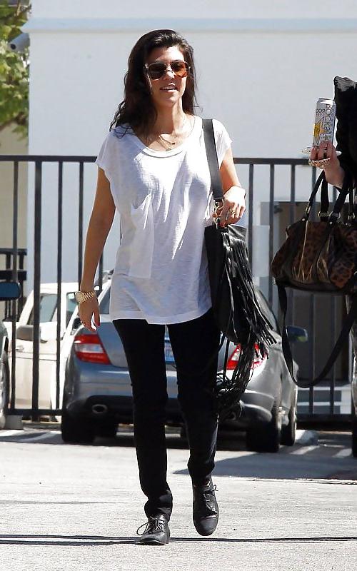 8P Kourtney Kardashian (black bra visible)