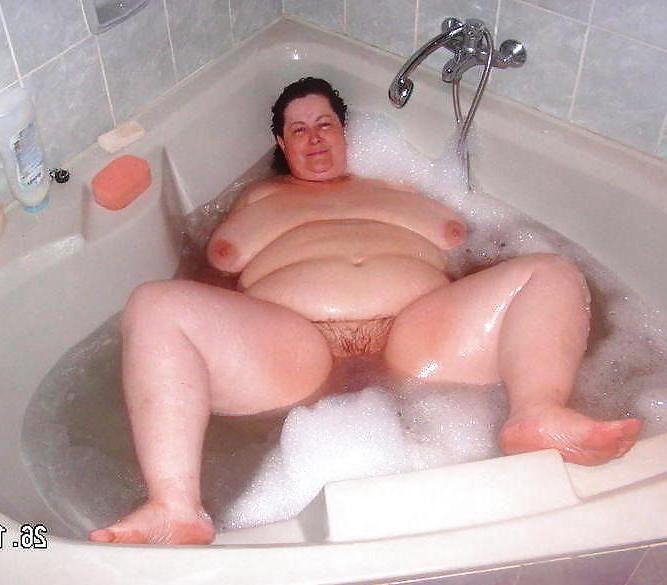 20P Older women in bath.