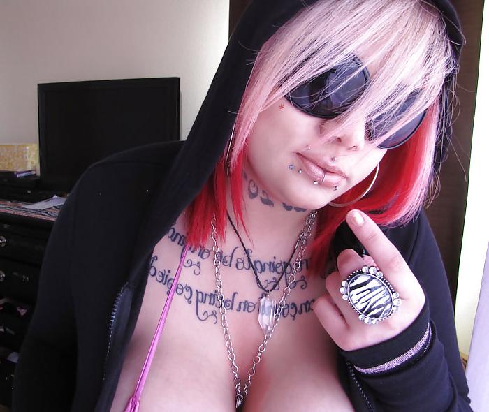 11P Antoinette shows off her huge fake tits once again!