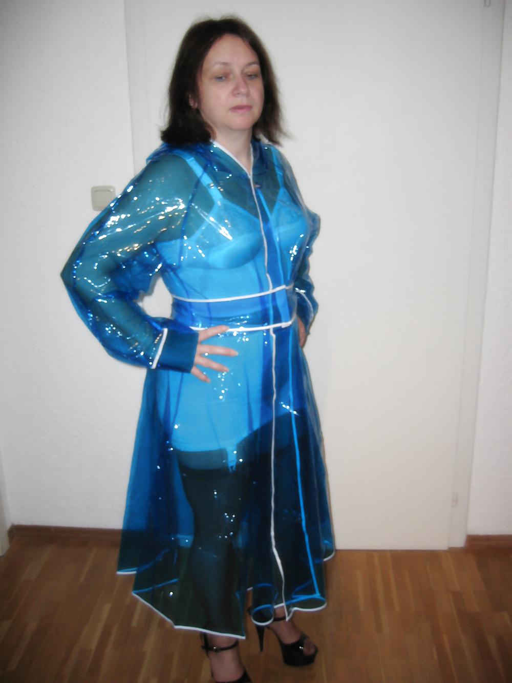 12P Wife in girdle and PVC Raincoat