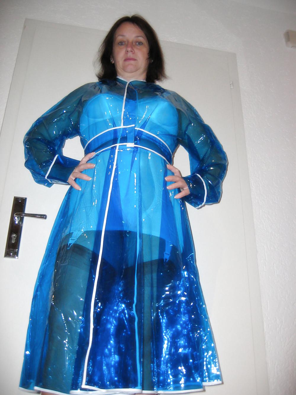 12P Wife in girdle and PVC Raincoat