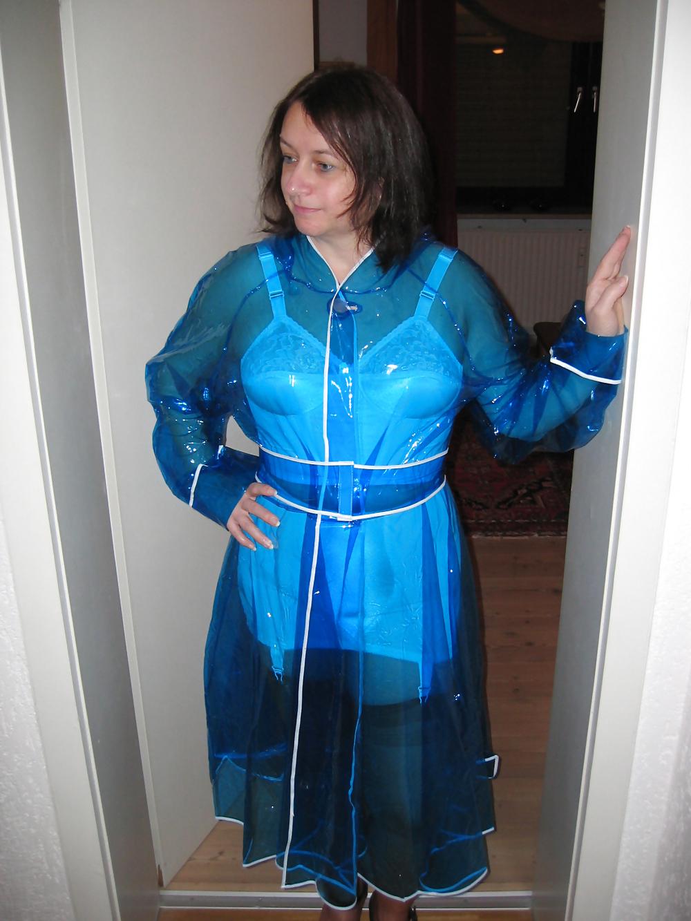 12P Wife in girdle and PVC Raincoat