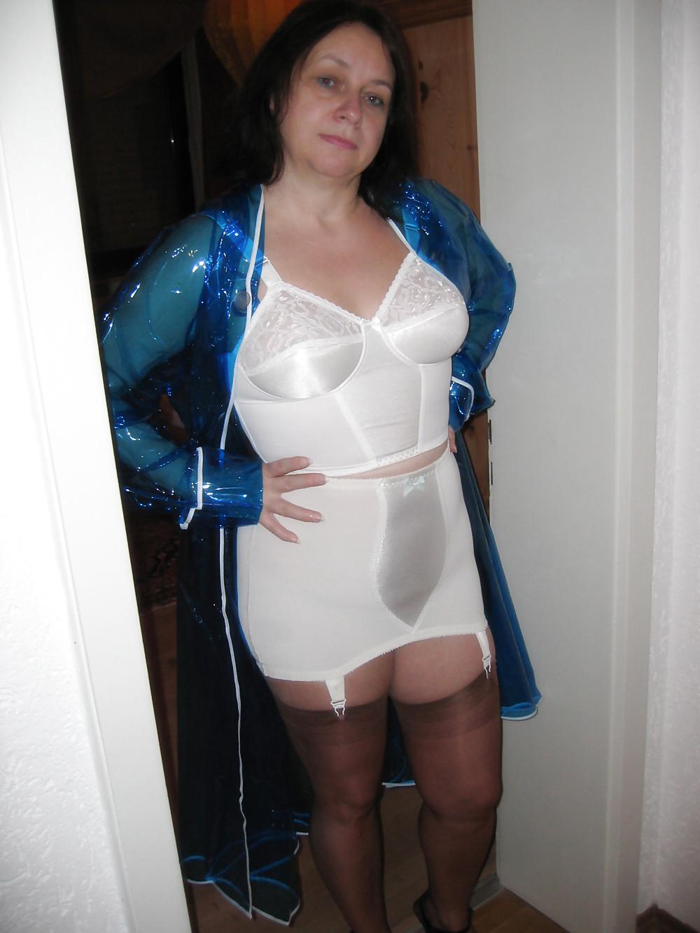 12P Wife in girdle and PVC Raincoat