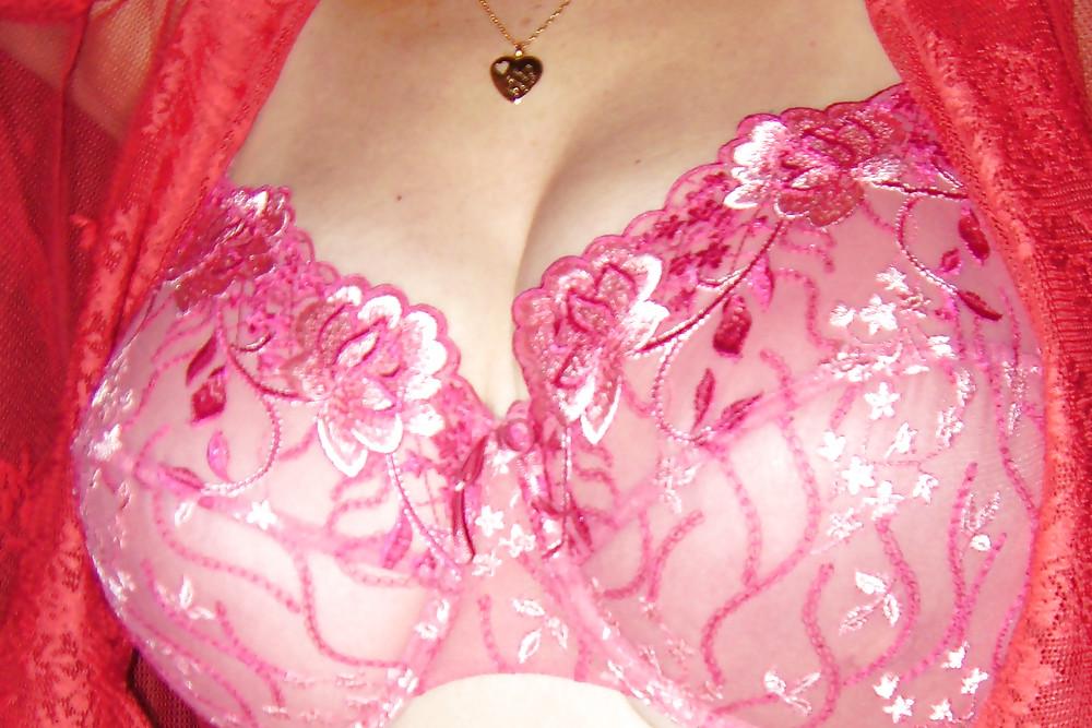 25P Her breasts in bra