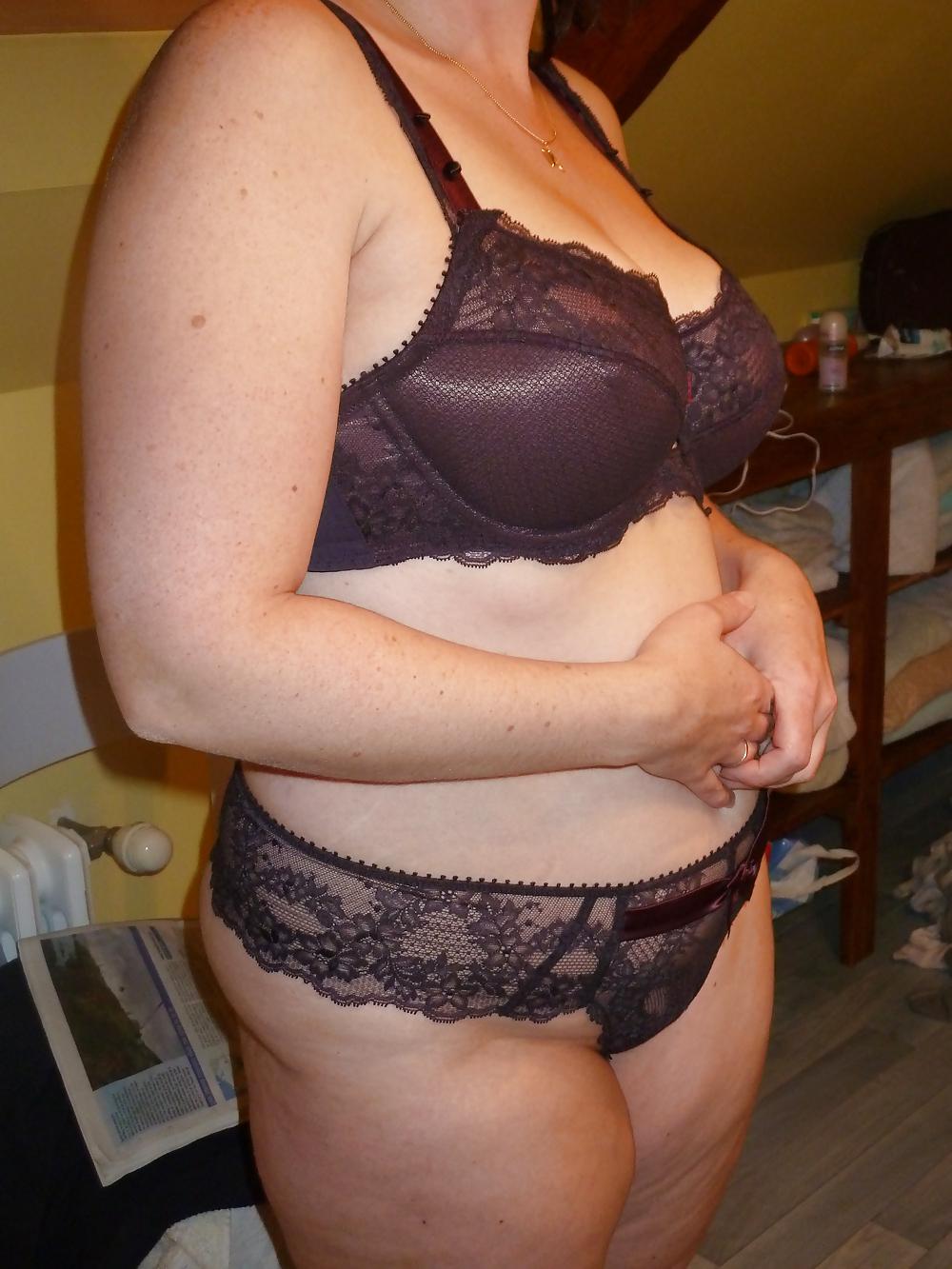 25P Her breasts in bra