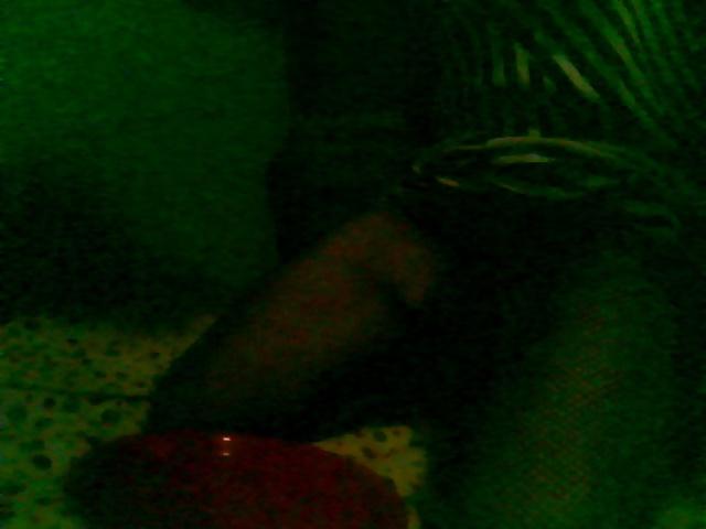 7P Vikki in a dark room