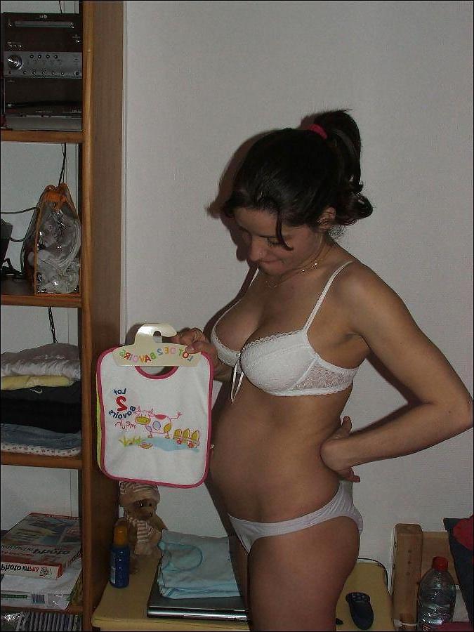 15P Sexy pregnant brunette