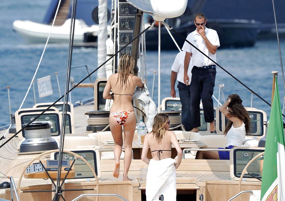 25P Bar Refaeli relaxes in a tiny bikini on a yacht in Cannes