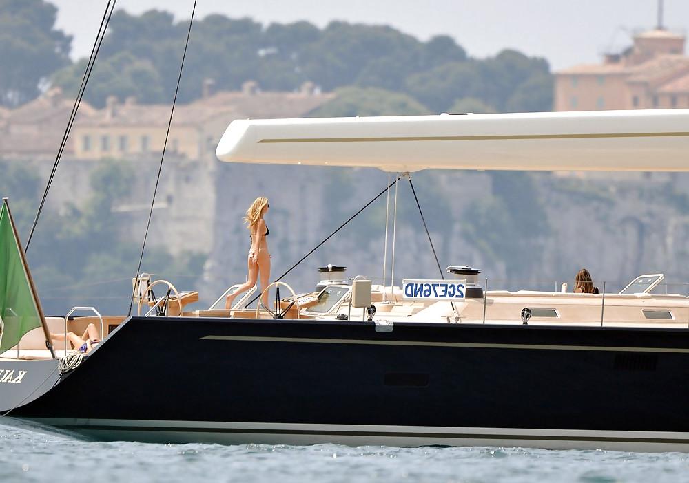 25P Bar Refaeli relaxes in a tiny bikini on a yacht in Cannes
