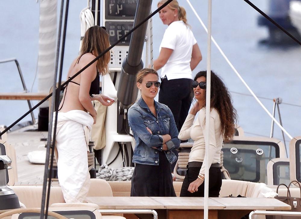 25P Bar Refaeli relaxes in a tiny bikini on a yacht in Cannes