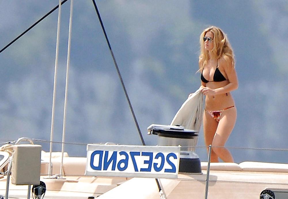 25P Bar Refaeli relaxes in a tiny bikini on a yacht in Cannes
