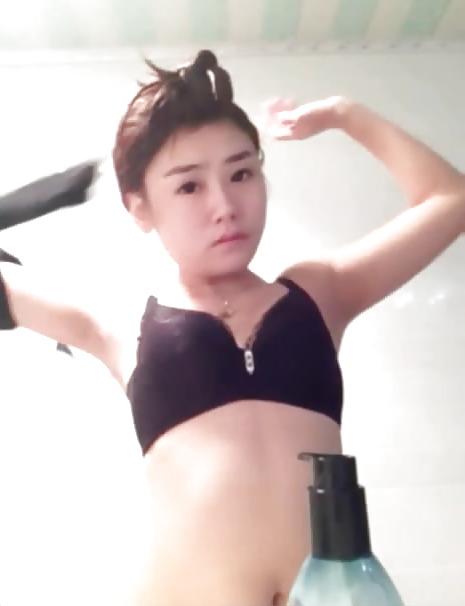 25P 0186 Asian Tease None Nude