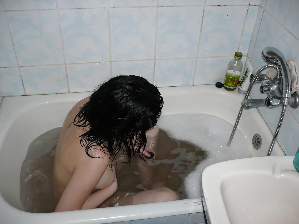 25P Young girl in bath