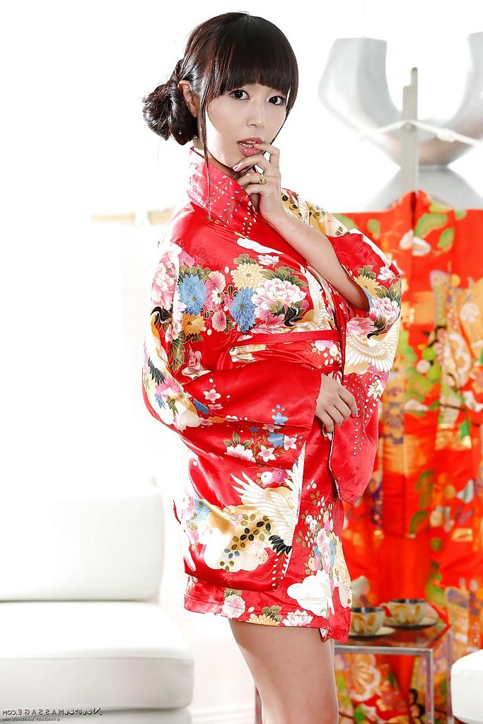 16P Japanese babe Marica Hase does a slow striptease out of Geisha uniform