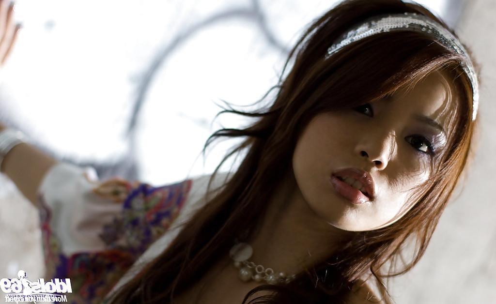 16P Hot ass asian teen Risa Kasumi exposing her gorgeous tits and trimmed pussy