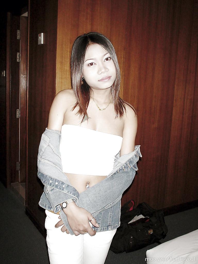 16P Cute asian teen babe exposing her tiny tits and hairy cunt in the shower