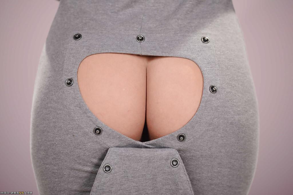 16P Busty babe Keisha Grey lets big boobs pop loose from jumpsuit