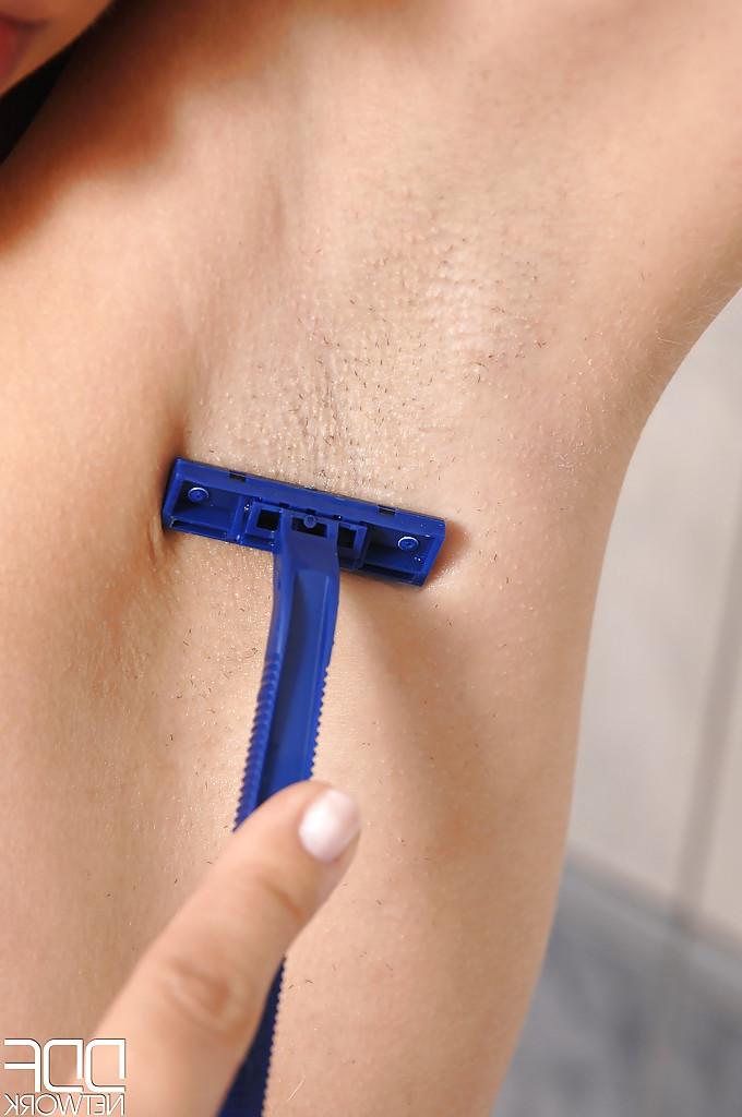 16P Gorgeous brunette slut Blue Angel shaving her armpits in the bathroom