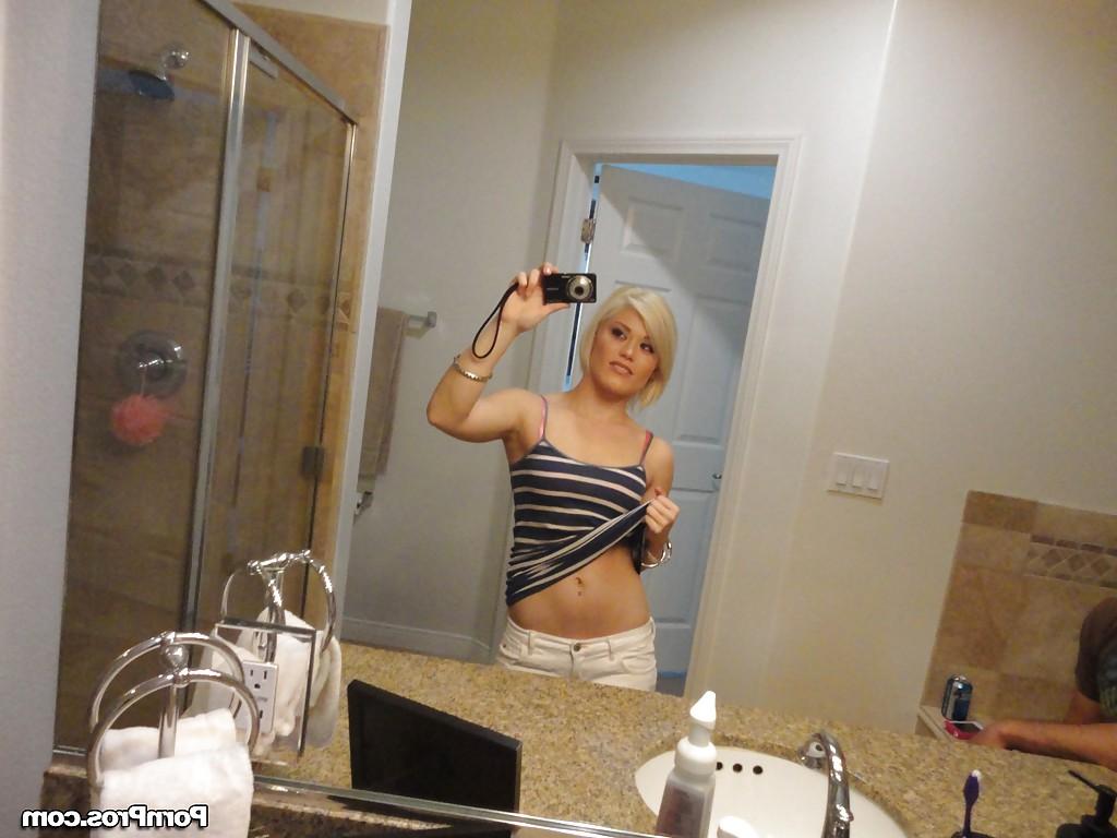 16P Young blonde hottie Ash Hollywood taking selfies in mirror while undressing