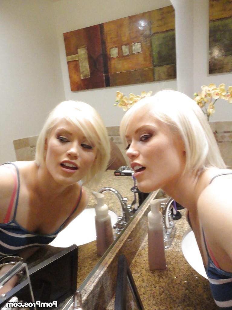 16P Young blonde hottie Ash Hollywood taking selfies in mirror while undressing