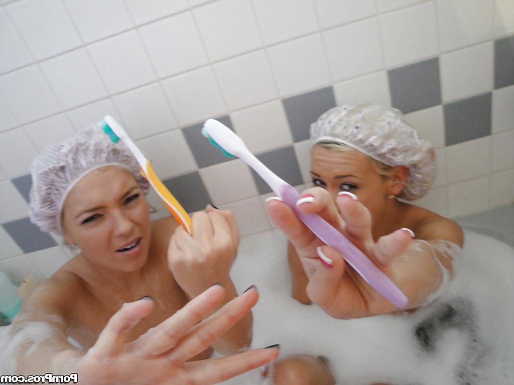 15P Young dykes Kasey Jordan and Ally Kay in bathtub with suction dildo