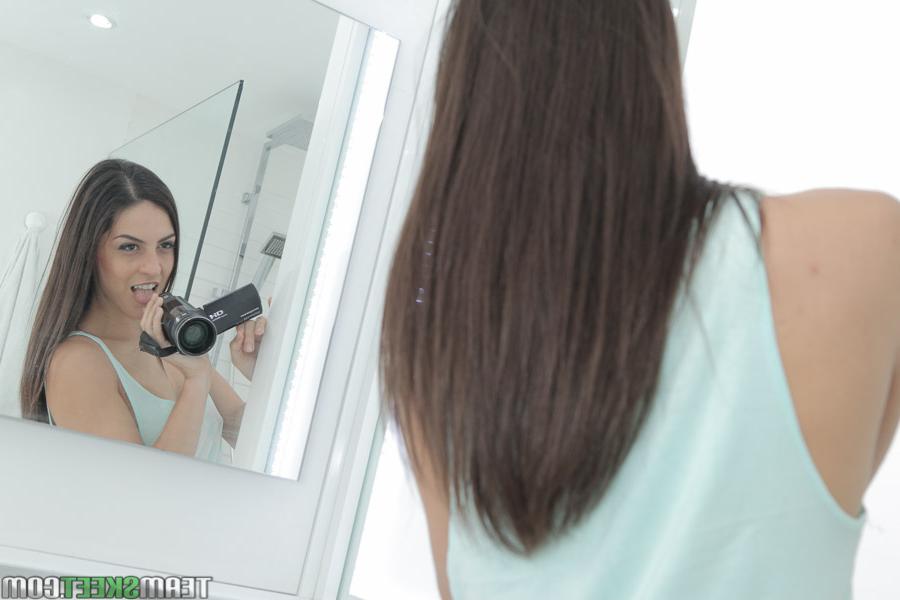 12P Amateur Latina model Carolina Abril taking self shots of bare tits and ass