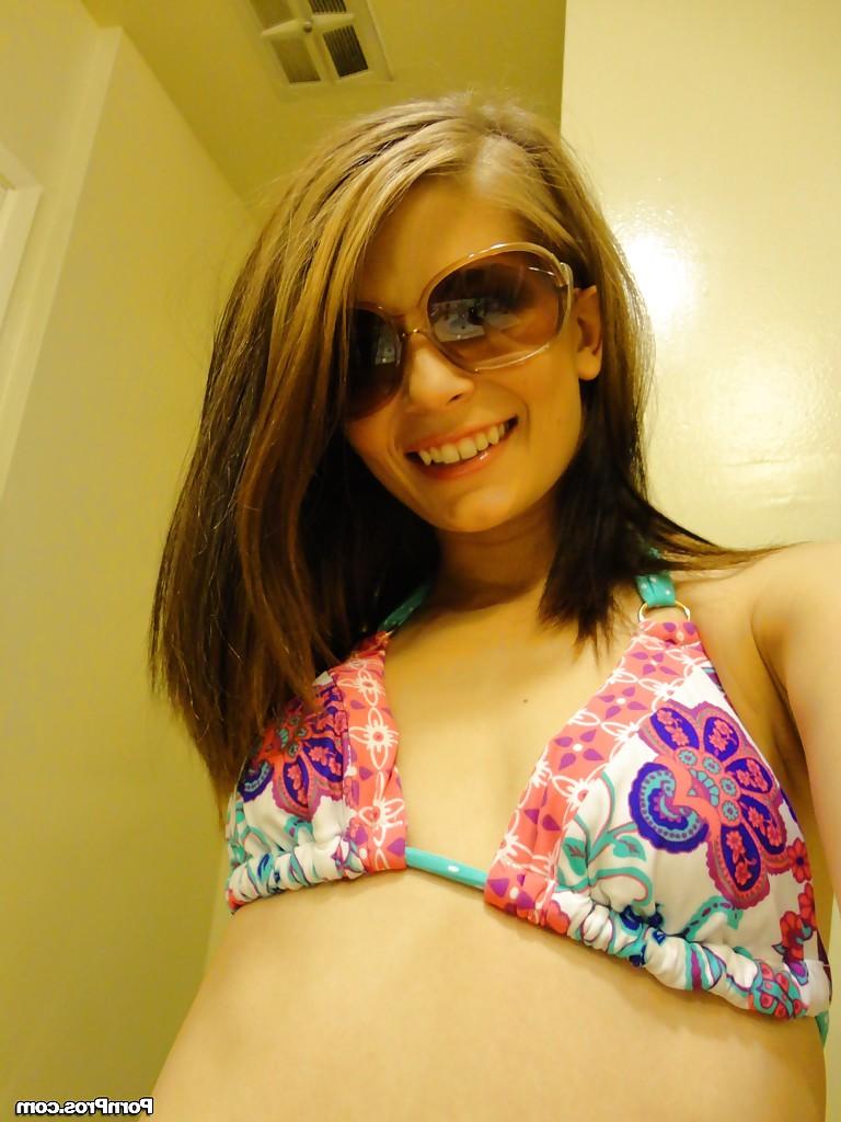 16P Teen babe in sun glasses Sensi Pearl poses naked in front of the mirror