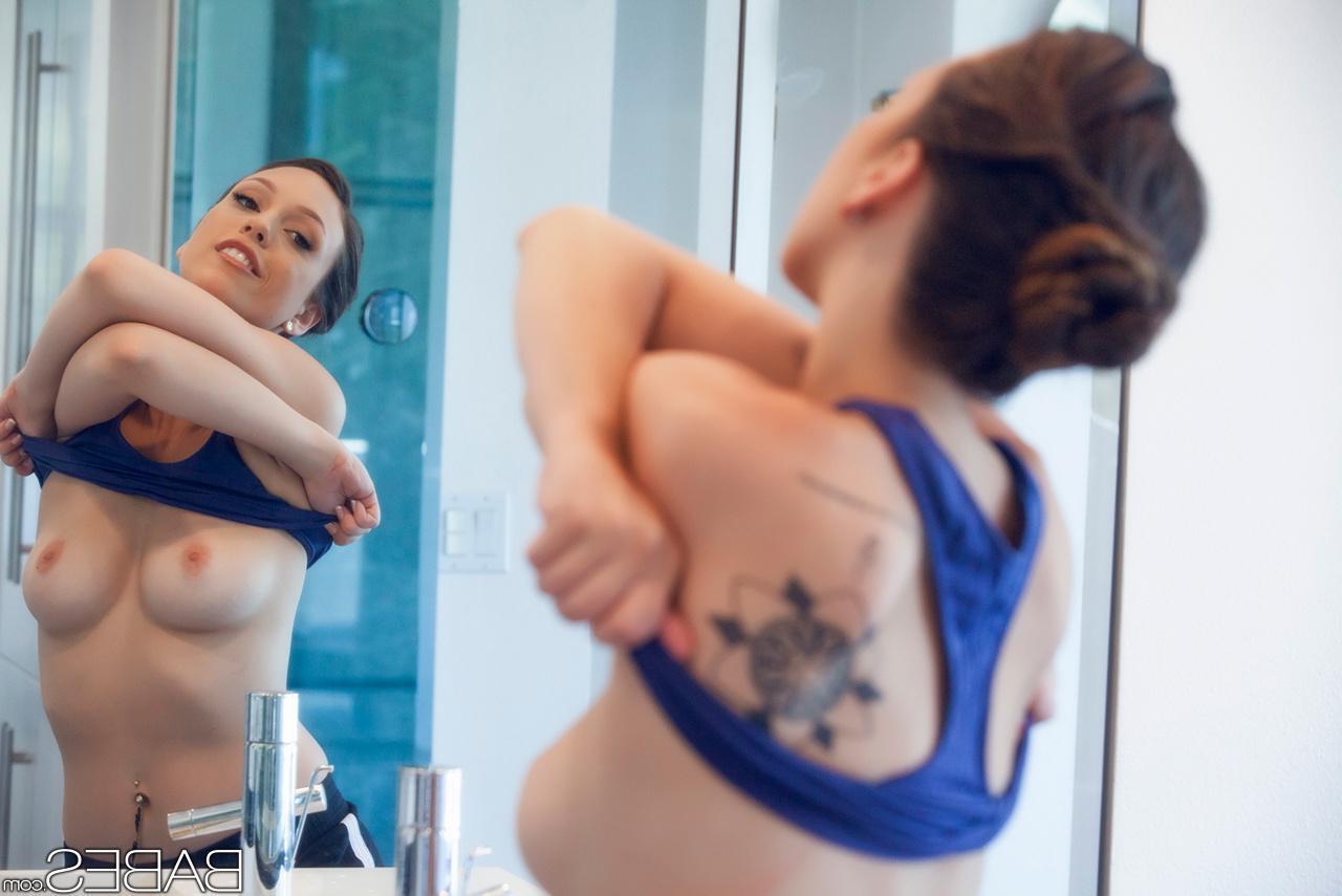 14P Wet babe Jade Nile showing off tattoos and phat ass in bathroom shower