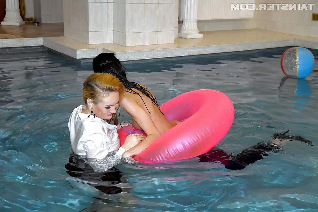 16P Seductive fully clothed babes in high heels having fun in the pool