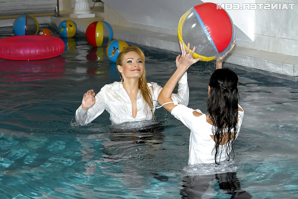 16P Seductive fully clothed babes in high heels having fun in the pool