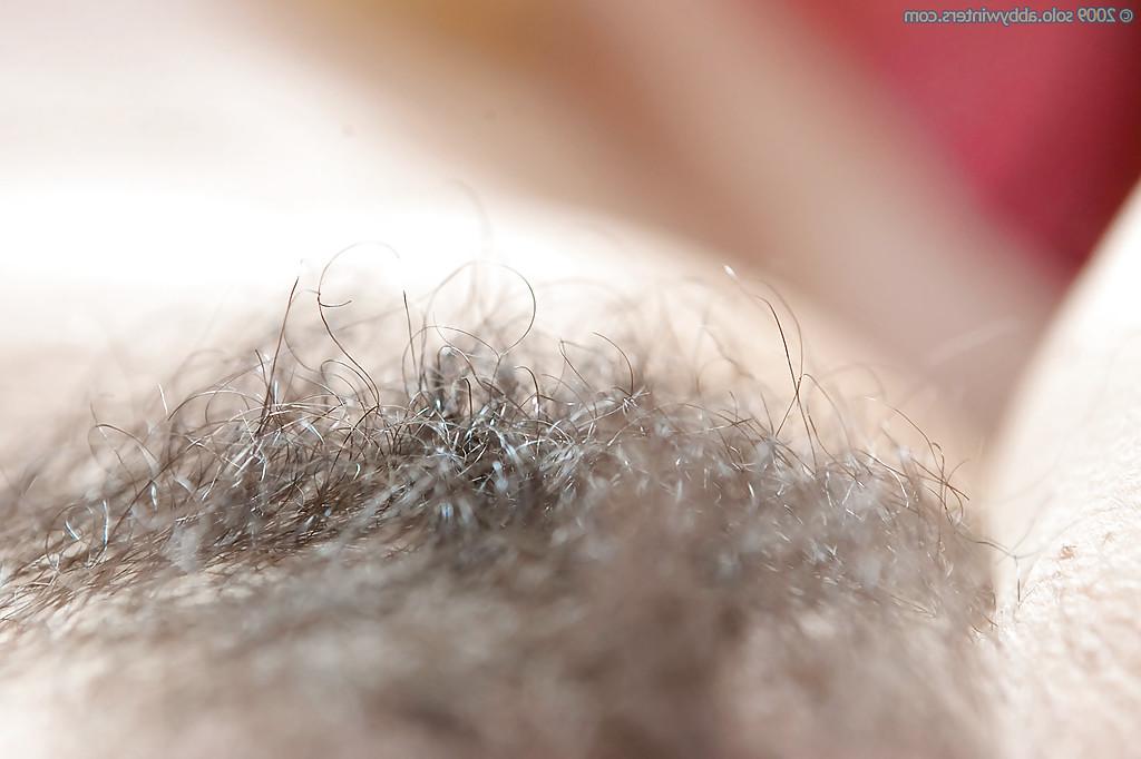 16P Hirsute model Estella Z strips naked to flash hairy armpits and vagina