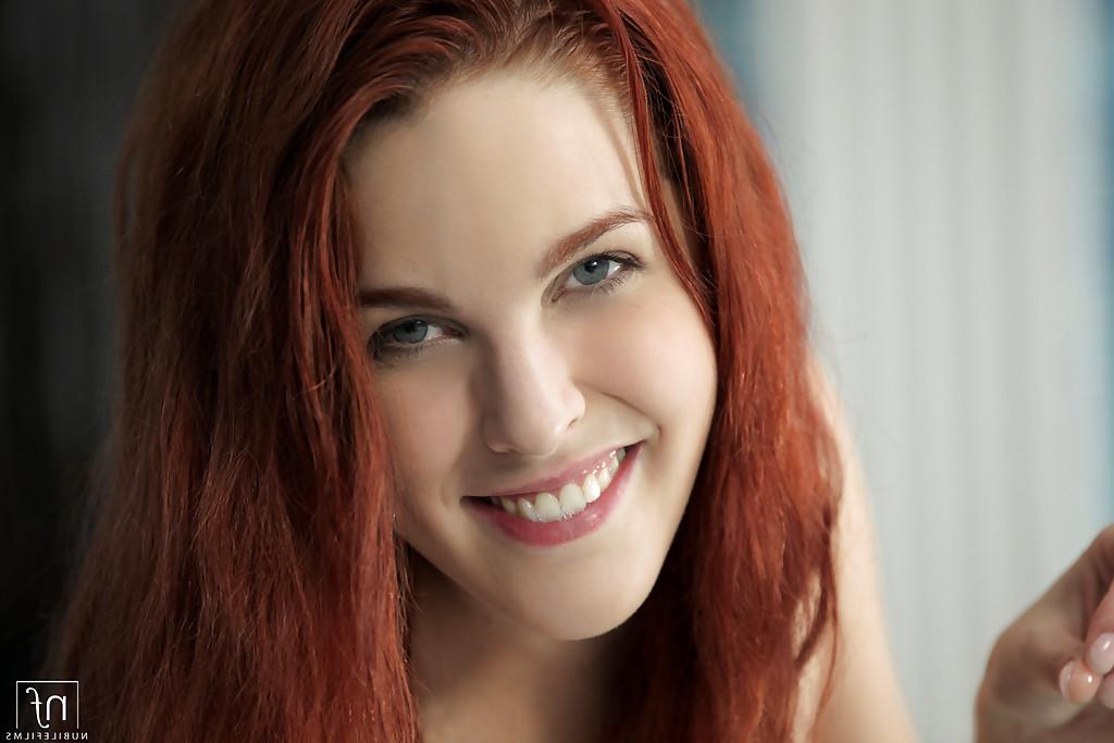 16P Young Euro redhead bares her wet and juicy teen pussy and masturbates