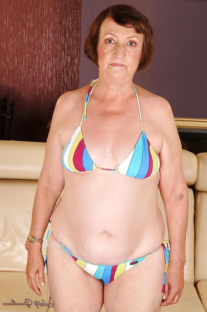 16P Fatty granny with tiny tits Eve Tickler taking off her bikini