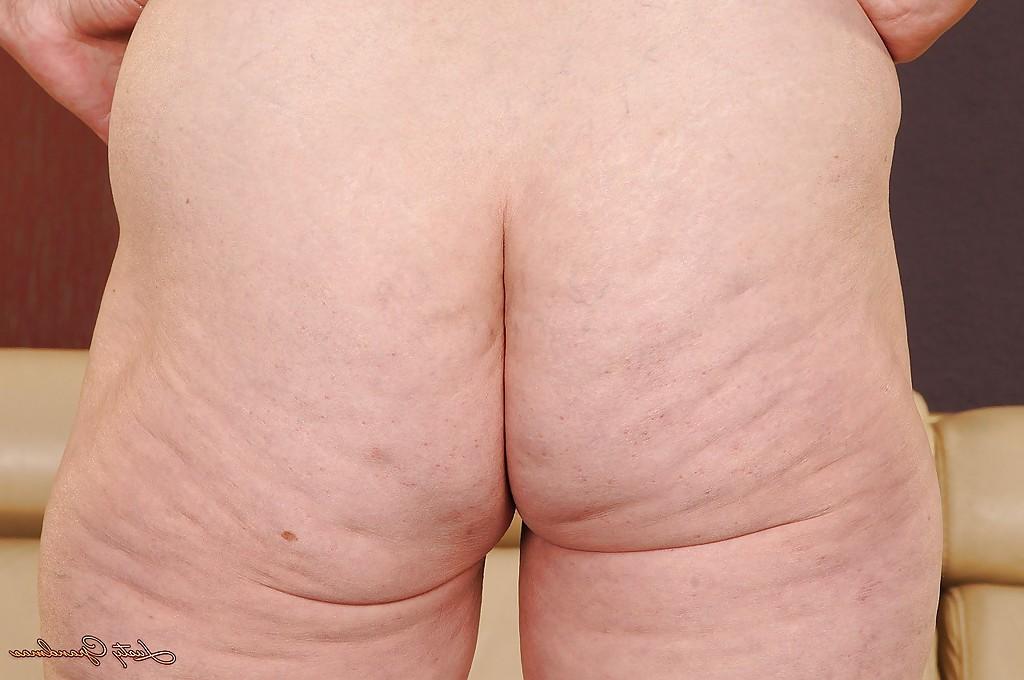 16P Fatty granny with tiny tits Eve Tickler taking off her bikini